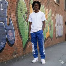 Load image into Gallery viewer, SG Elite Nylon Windbreaker Pants
