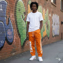 Load image into Gallery viewer, SG Elite Nylon Windbreaker Pants
