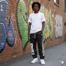 Load image into Gallery viewer, SG Elite Nylon Windbreaker Pants
