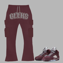 Load image into Gallery viewer, GEEKS Stacked Cargo Joggers to match Retro Jordan 5 Burgundy sneakers
