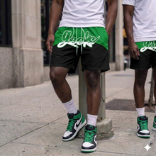 Load image into Gallery viewer, GEEKS Windbreaker Shorts to match Retro Jordan 1 Lucky Green sneakers

