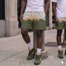 Load image into Gallery viewer, GEEKS Windbreaker Shorts to match Retro Jordan 5 Olive sneakers
