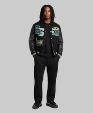Load image into Gallery viewer, SG The GOAT Vintage Varsity Jacket to match Retro Jordan 11 Gamma Blue sneakers
