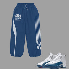 Load image into Gallery viewer, SG Baggy Windbreaker Pants to match Retro Jordan 12 French Blue sneakers
