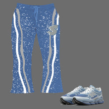 Load image into Gallery viewer, S Windy Baggy Track Pants to match New Balance Abzorb 2000 Baby Blue sneakers
